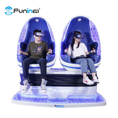 青い2人の座席プレーヤー及び黒い9Dバーチャル リアリティのシミュレーターのアーケード・ゲーム機械VR卵の椅子